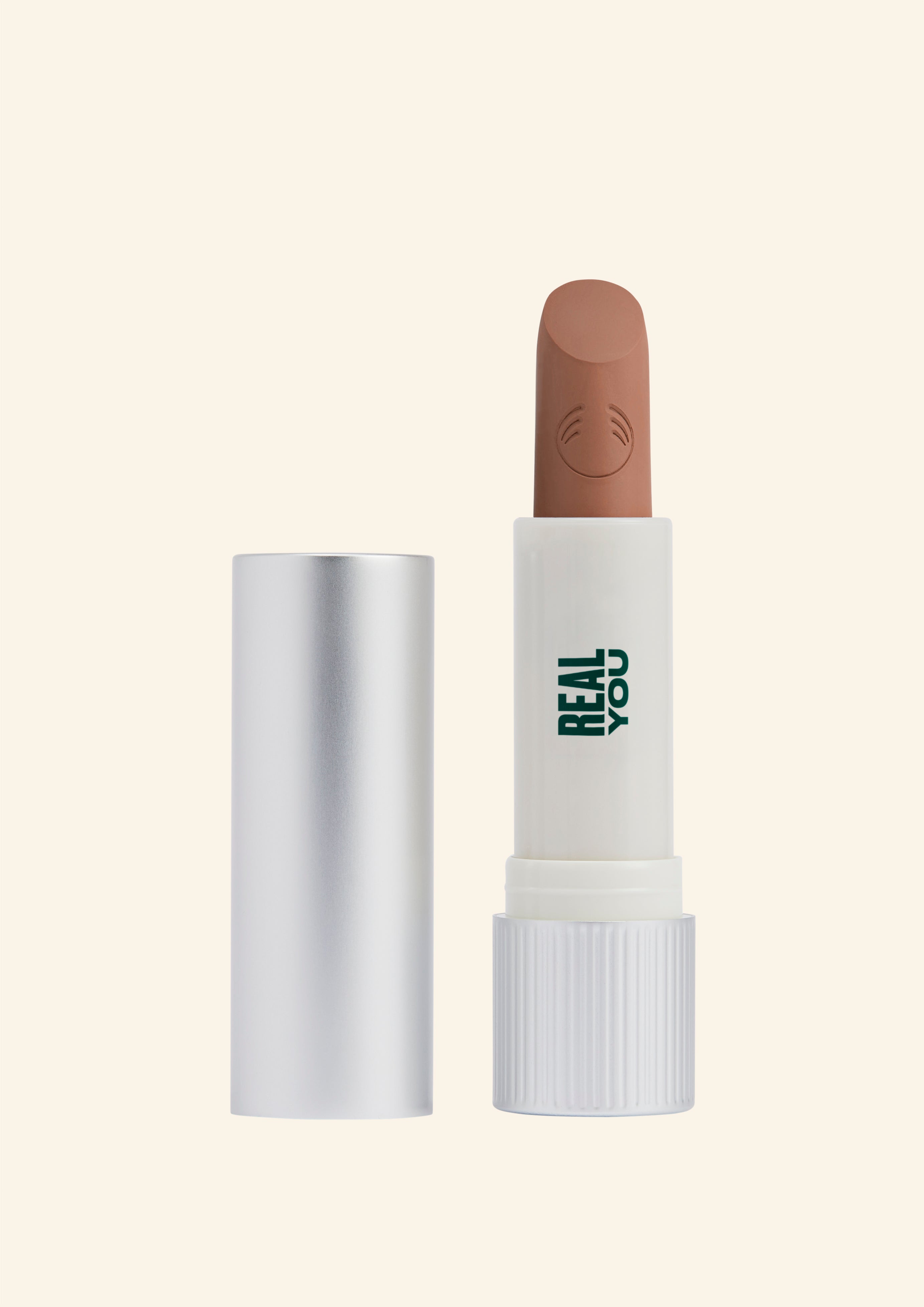 Detalle de la fórmula ligera y enriquecida con manteca de karité de Comercio Justo en Ghana en el labial PepTalk Recargable, mostrando su textura cremosa