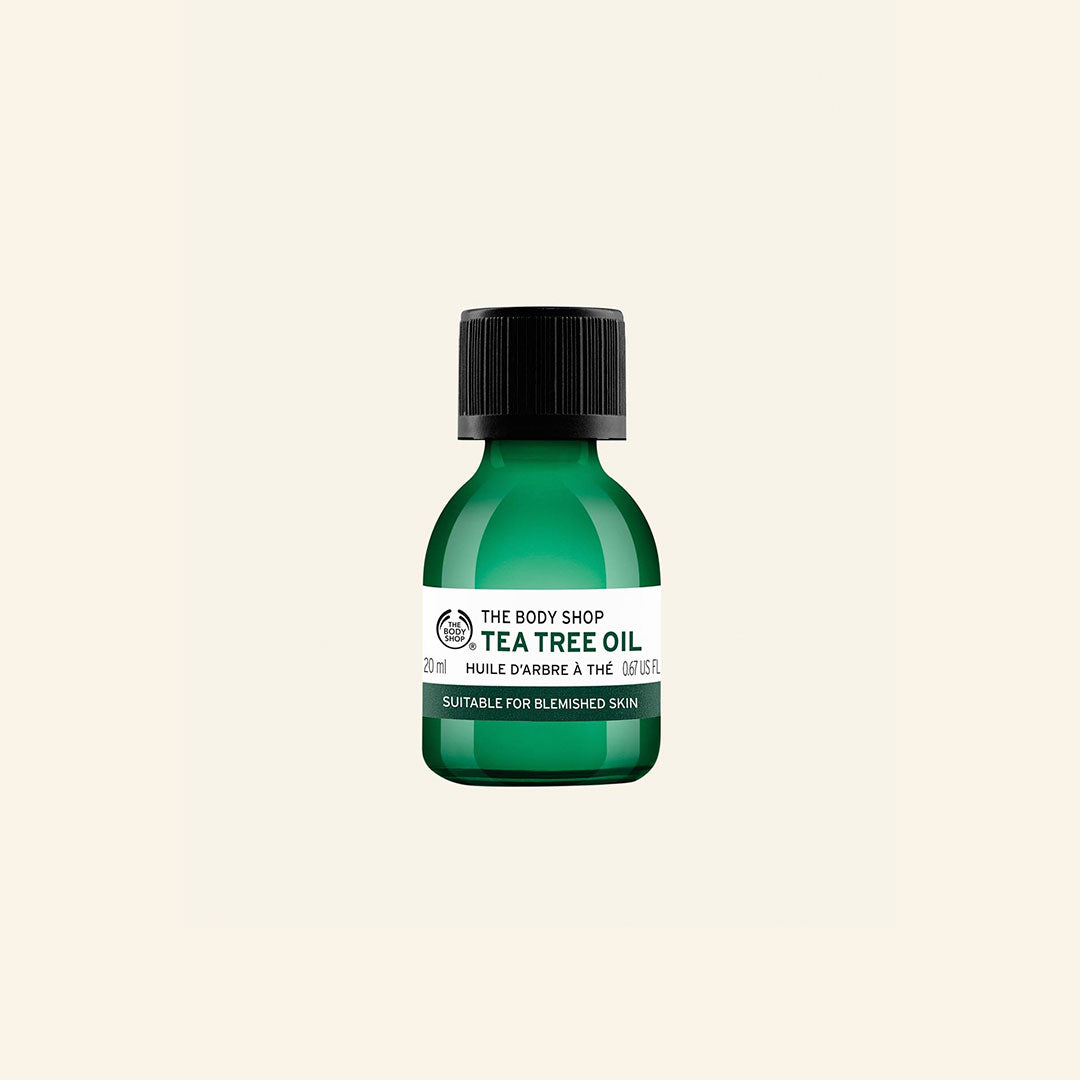 Botella de 20 ml de Aceite de Tea Tree puro y sostenible, ideal para combatir imperfecciones y reducir manchas en piel grasa, con ingredientes naturales y veganos de comercio justo en Kenia