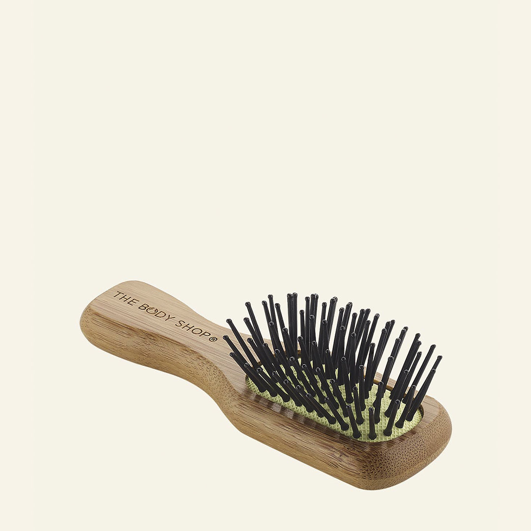 Cepillo mini de bambú compacto para viajes, que desenreda, peina y masajea suavemente el cuero cabelludo
