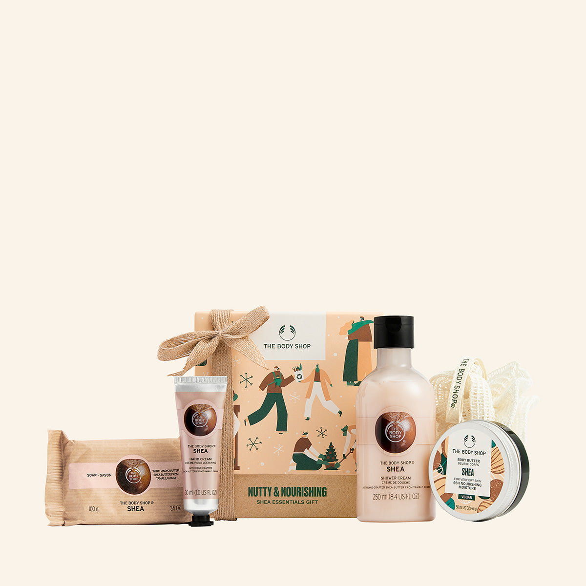Imagen del Regalo chico de Karité, conjunto de productos de cuidado corporal con manteca de Karité, que incluye gel de ducha, body butter, bálsamo de manos, jabón y una borla de baño, presentado en un empaque ecológico y sostenible