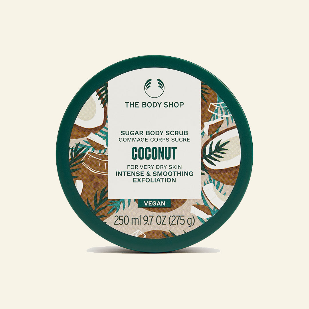 Exfoliante corporal de coco orgánico y azúcar en envase reciclable de 250ml, ideal para pieles secas, que elimina células muertas, revitaliza y deja la piel suave, con fragancia cremosa y delicada, elaborado con ingredientes naturales y empaquetado responsablemente