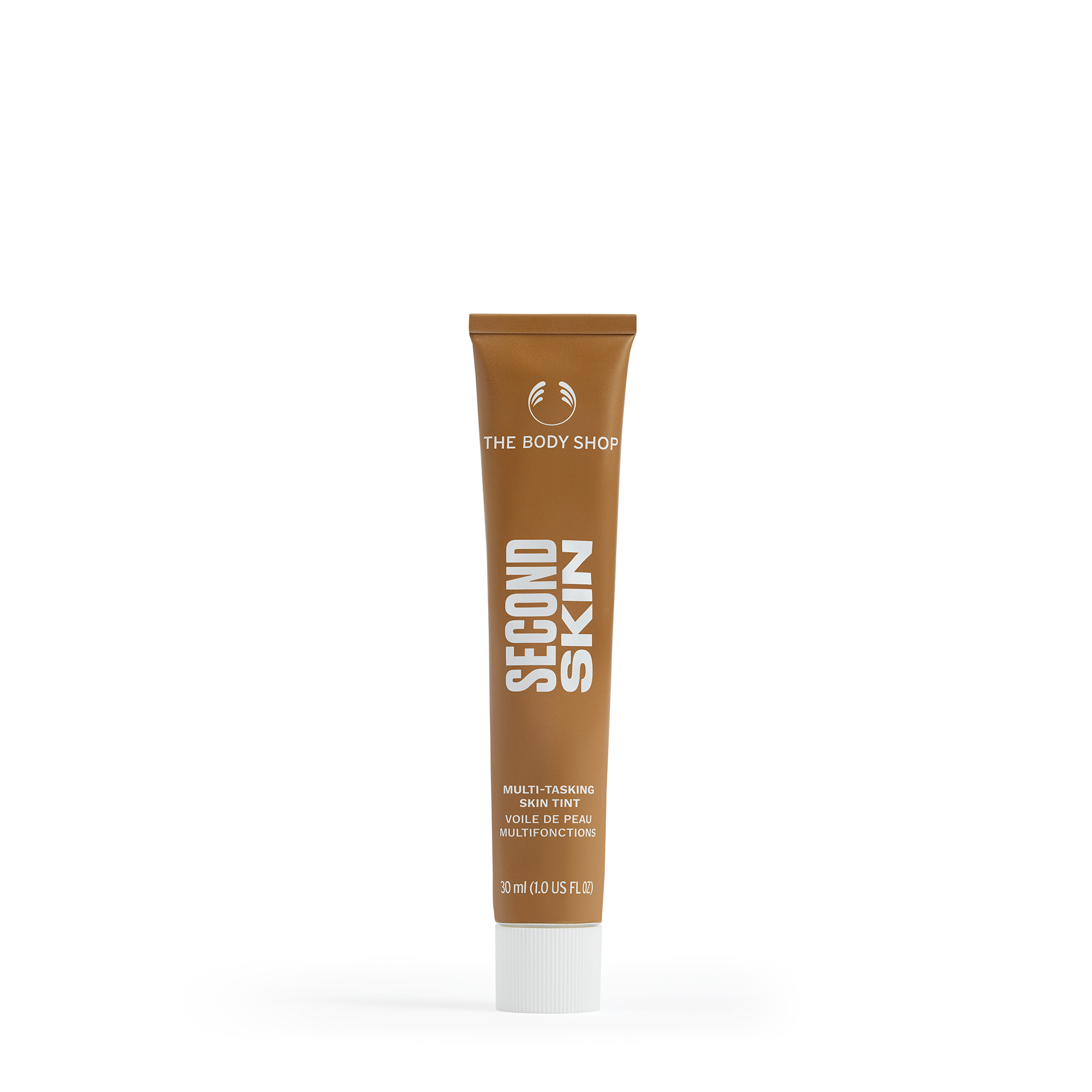 Base de maquillaje tipo sérum en tono tono Tan 1C que ofrece un acabado ligero, uniforme y luminoso, enriquecida con ingredientes naturales como aceite de marula y ácido hialurónico para hidratar y equilibrar la piel con un toque de color natural